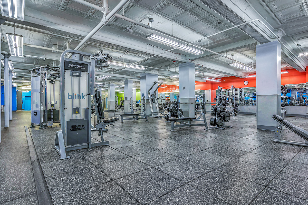Open training floor with equipment at Blink Fitness Perth Amboy, NJ